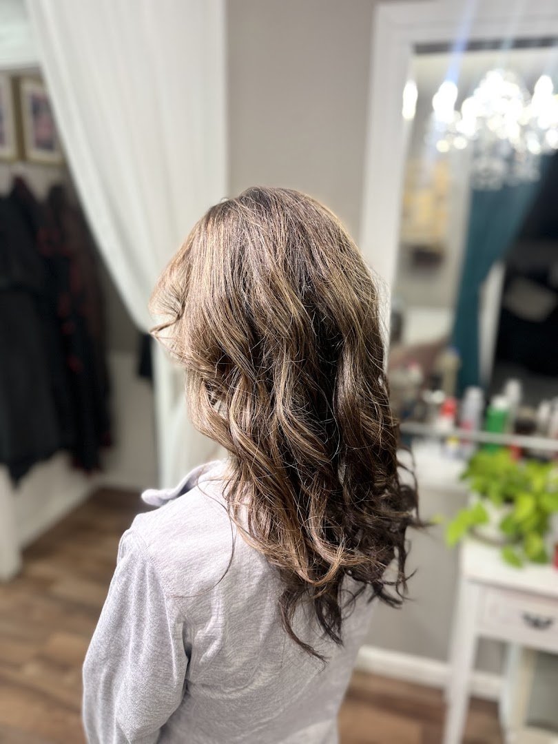 Haircut and color service area in a tidy salon.